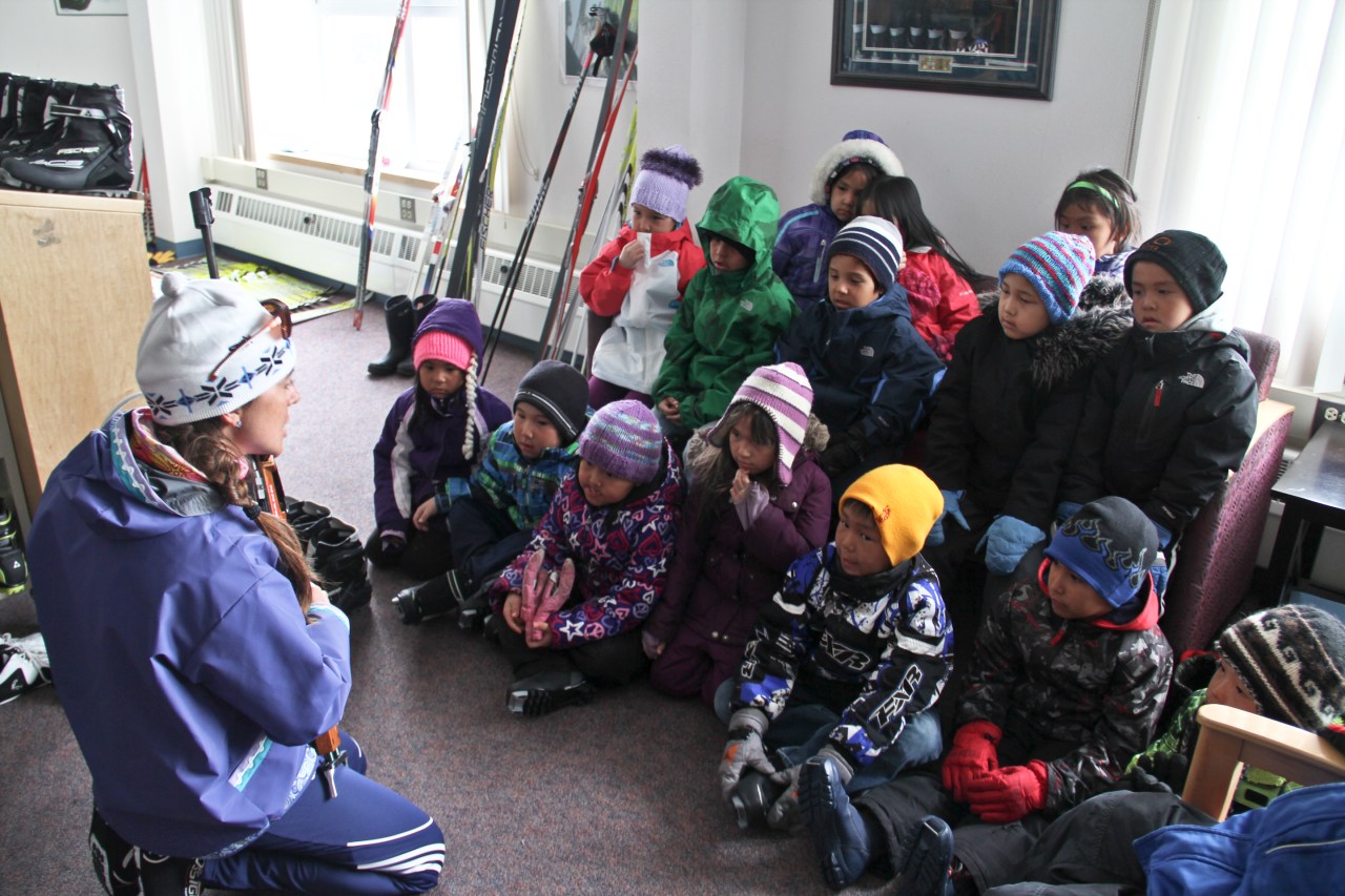 Coach Sara teaching the Kindergartners about Biathlon. 